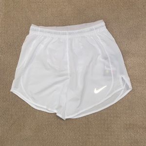 White Nike running shorts